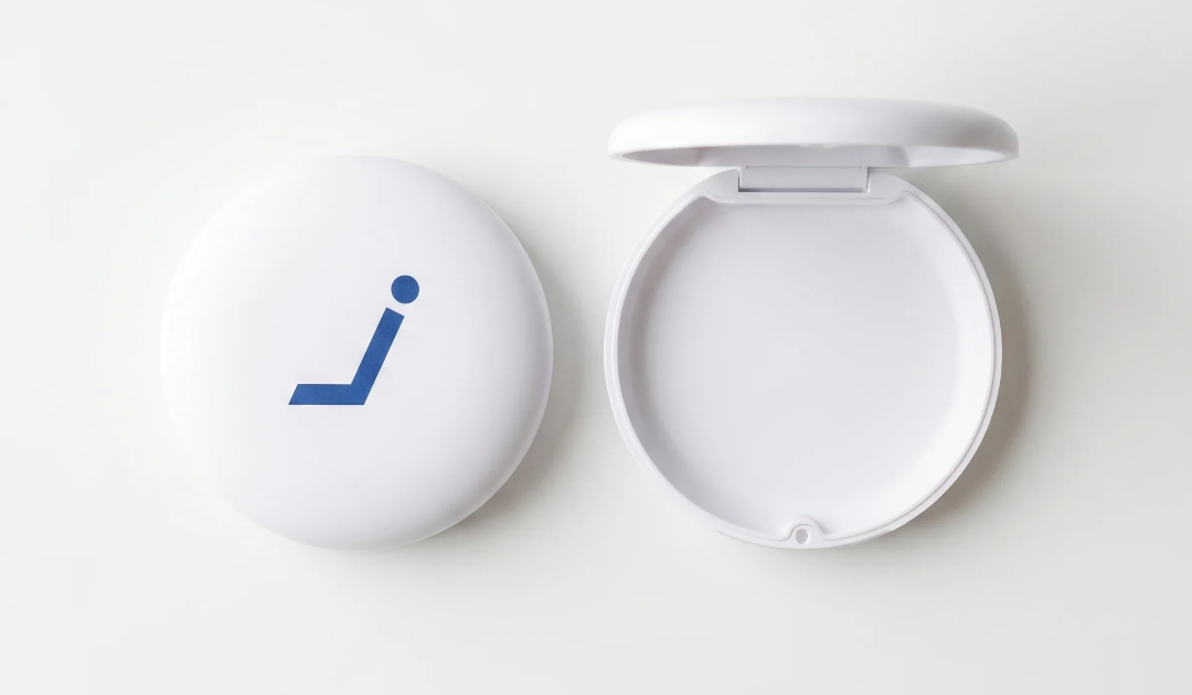 open empty retainer case on white surface Jawology