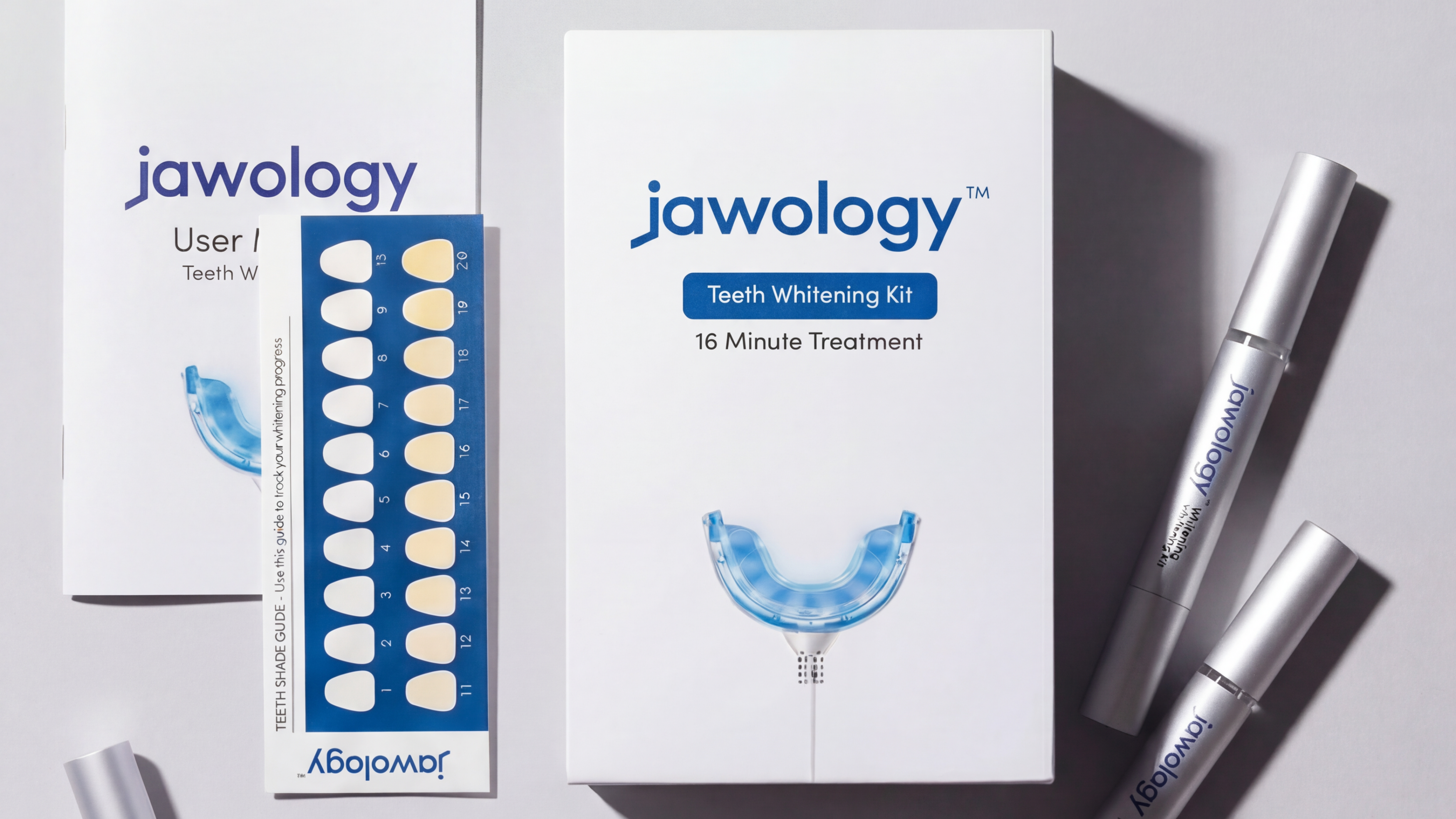 Whitening kit with shade guide, pens and manual laid flat