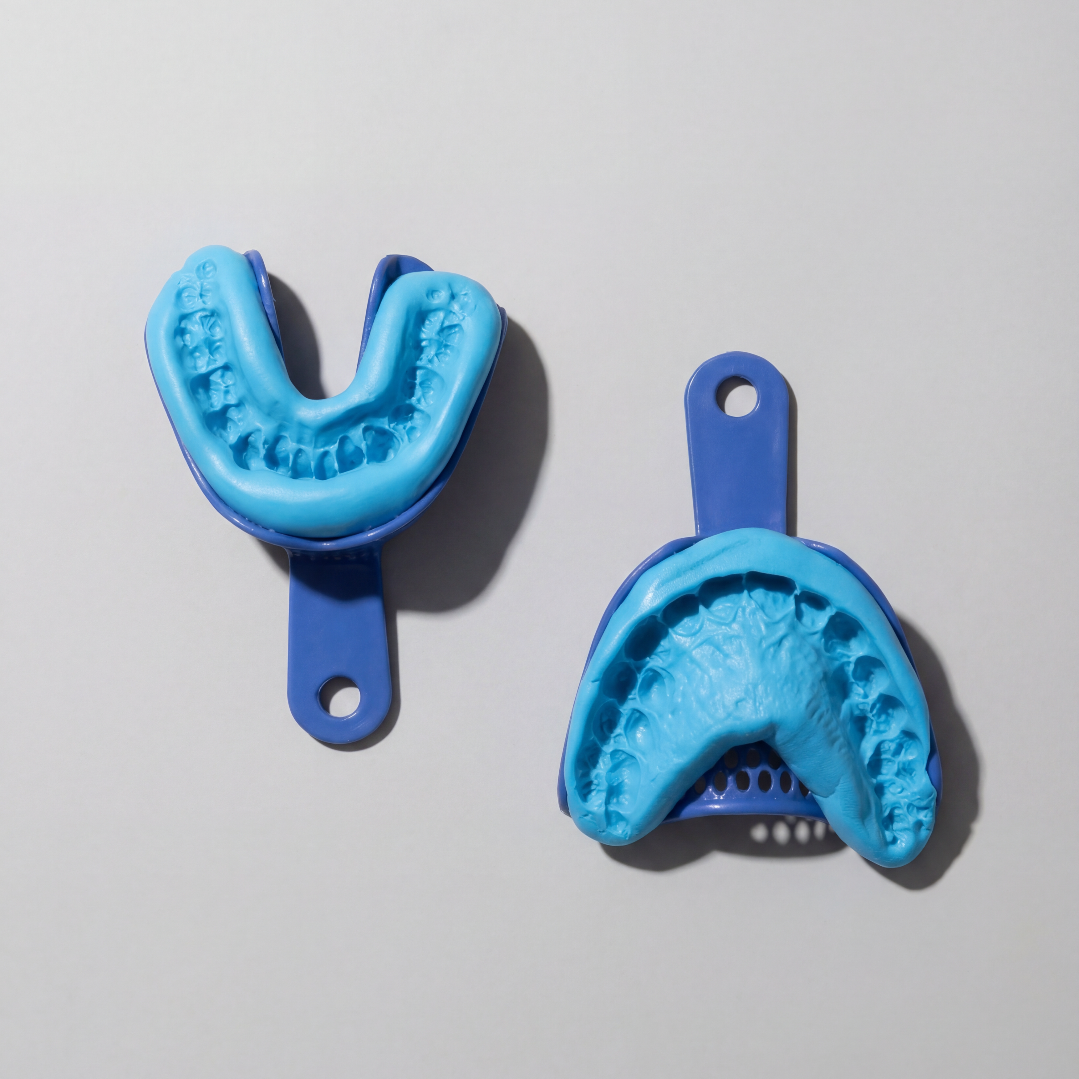 two completed jawology impression kit moulds ready for returning to lab