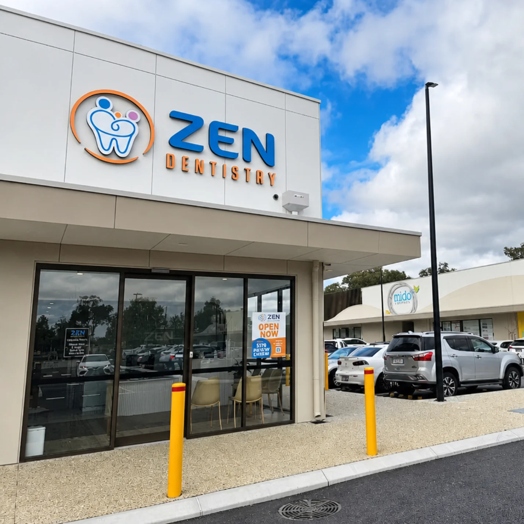 Zen Dentistry building with logo and sign on a clear day